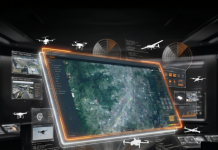 VOTIX at the NYS Public Safety UAS Summit 2026: Introducing Situation Rooms to New York’s First Responder Community Illustration of a drone operations command center: a central map display with mission markers, surrounded by floating live video feeds, radar sweeps, telemetry panels, and drone icons.