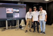 UTAC 2026 Ran on VOTIX Situation Rooms VOTIX team members at UTAC 2026 in front of the Situation Rooms platform showing live multi-feed video and telemetry on screen